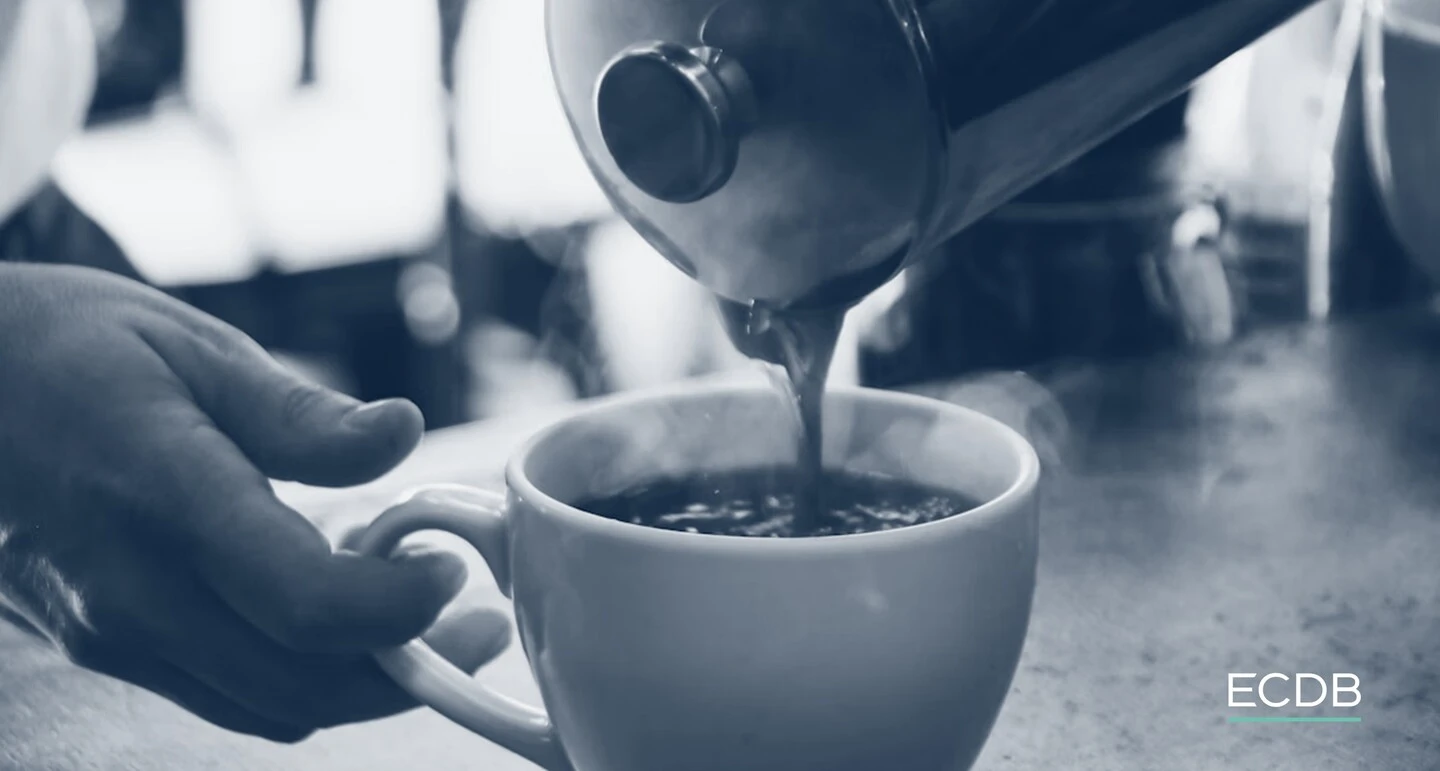 Pouring Coffee in a Cup